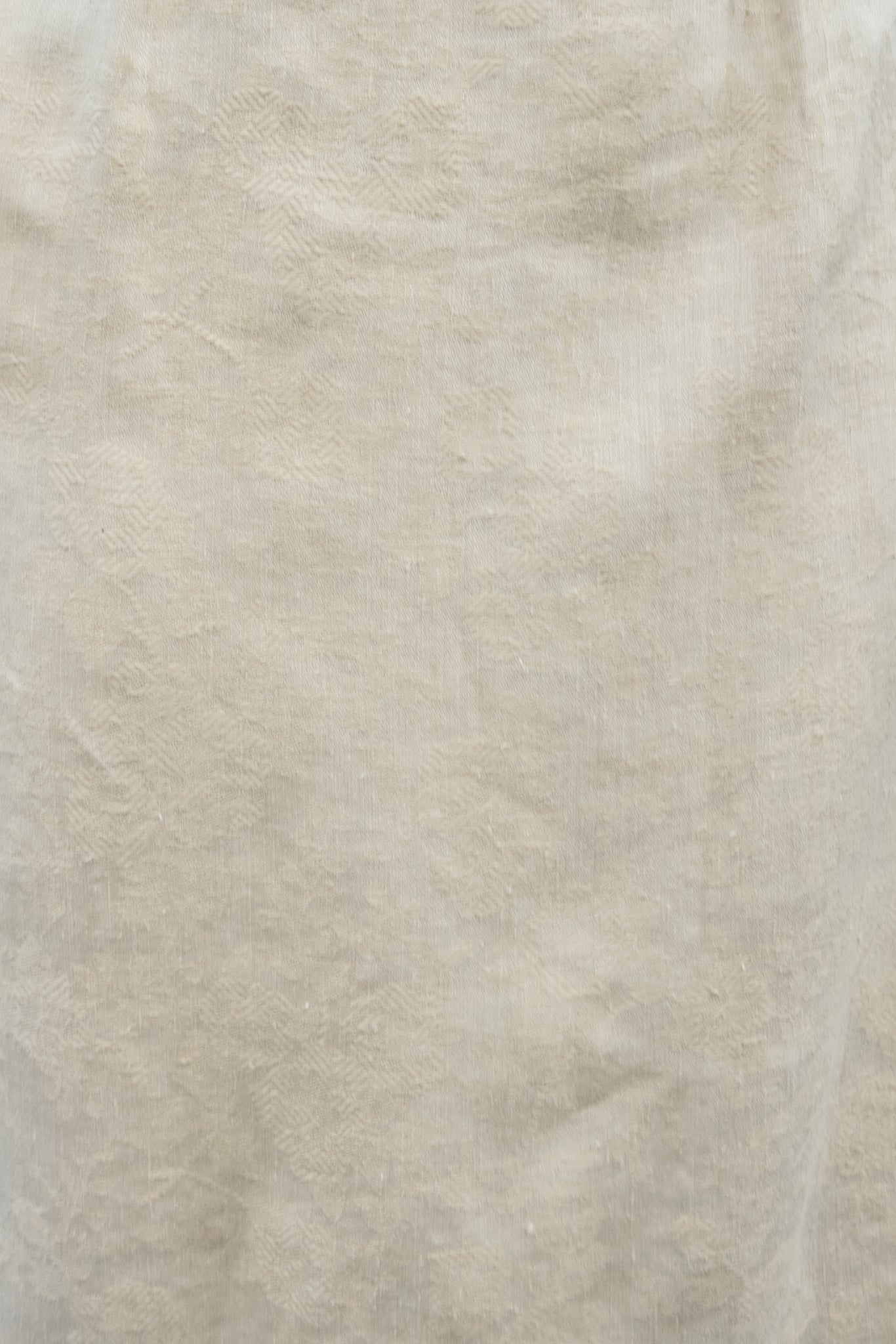 Close-up of beige fabric texture